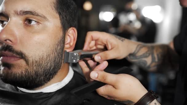 depositphotos 202184728 stock video tattoed barber shears the customers